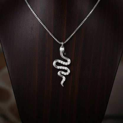 reptile jewellery. snake necklace on wooden stand