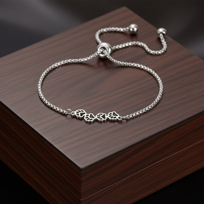 elegant bracelet featuring four paw prints