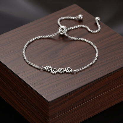 elegant bracelet featuring four paw prints