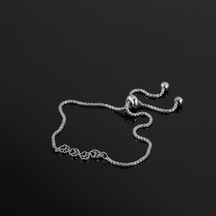 silver unisex bracelet for pet lovers. Four paw prints. Dog. Cat