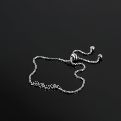 silver unisex bracelet for pet lovers. Four paw prints. Dog. Cat
